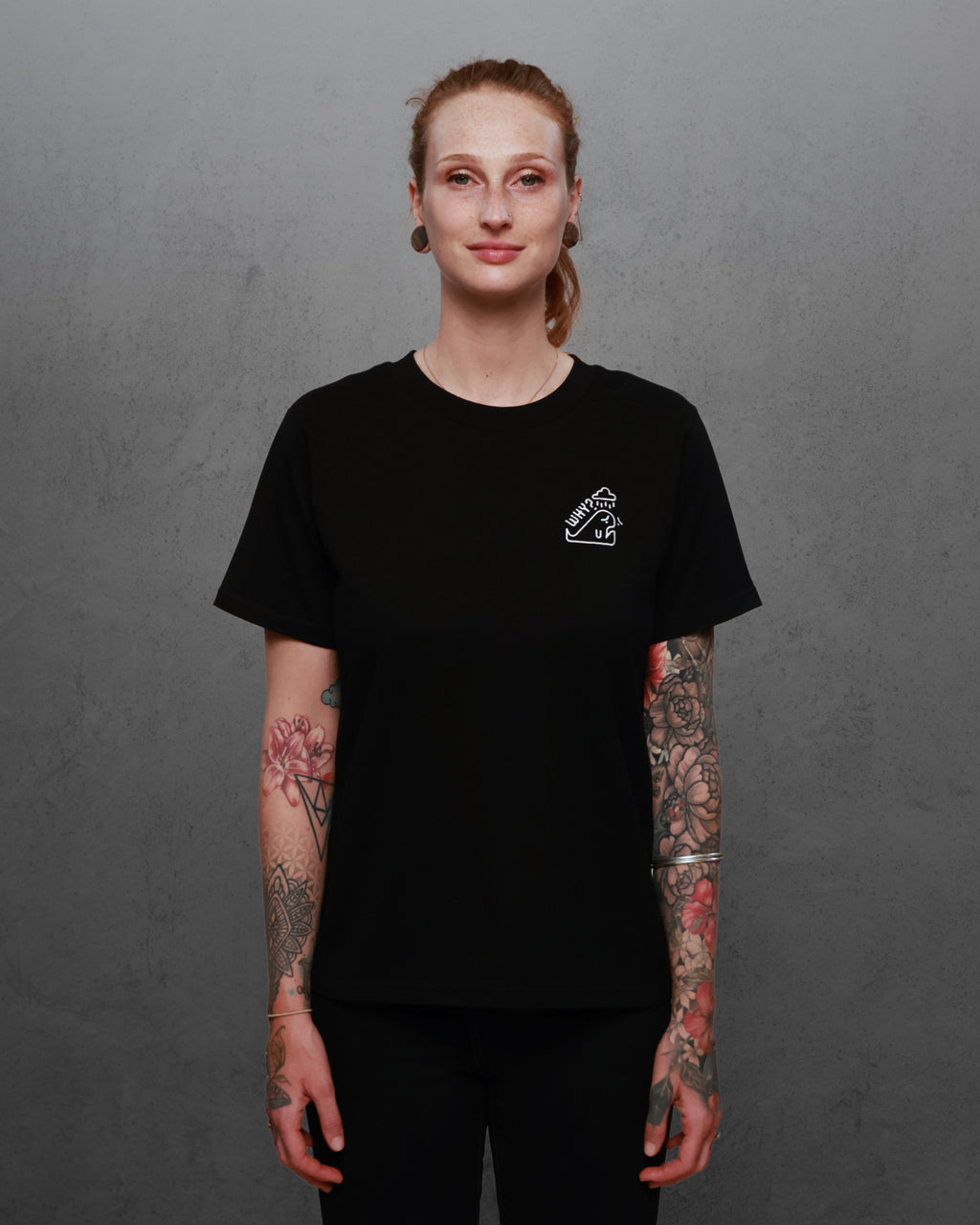 Woman wearing Worst-case Whale tee in black