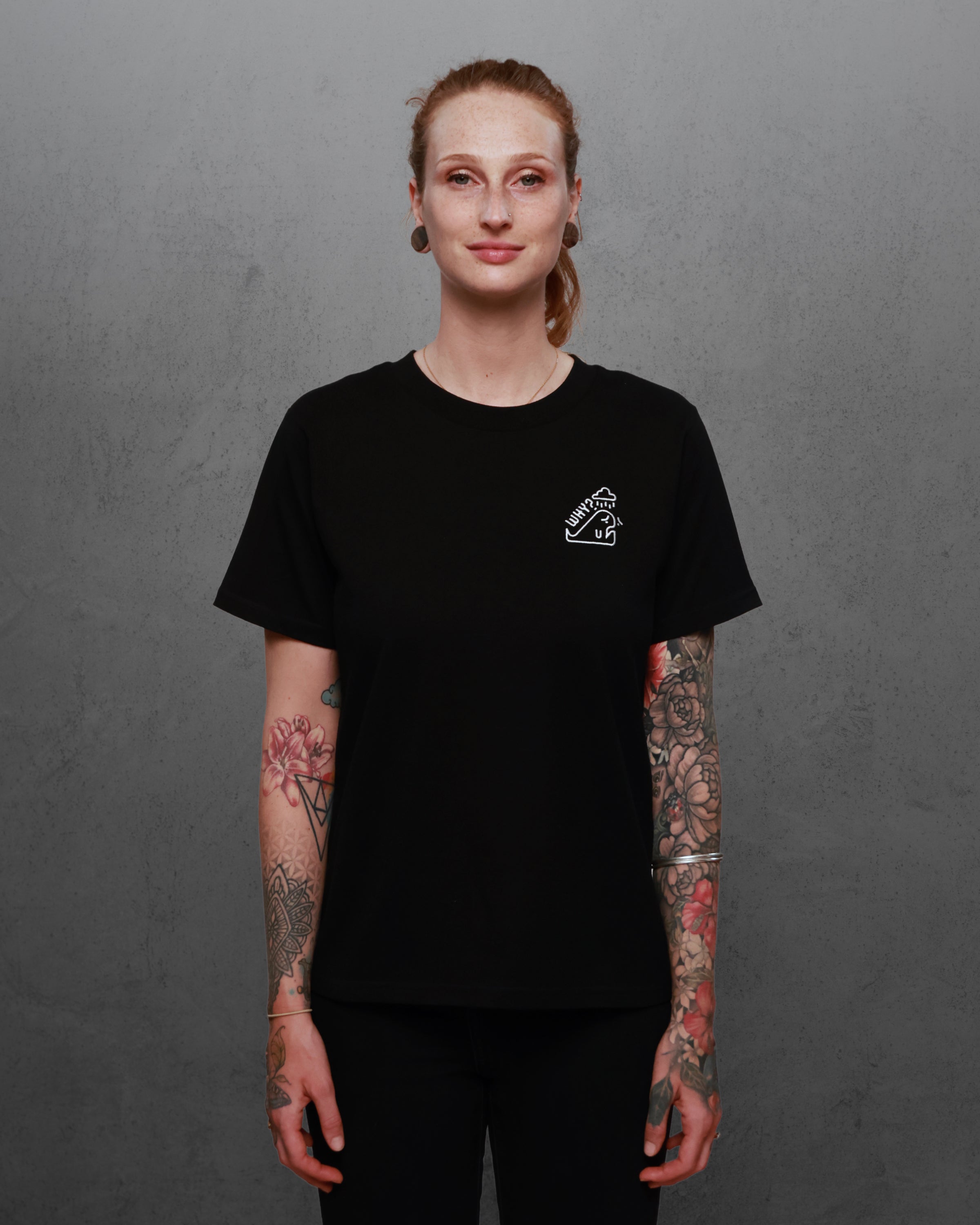 Woman wearing Worst-case Whale tee in black